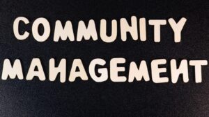 a close up of a sign that says community management