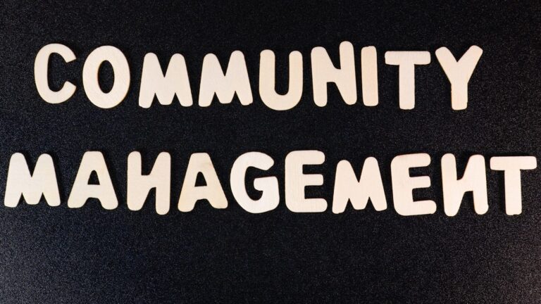 A Close Up Of A Sign That Says Community Management
